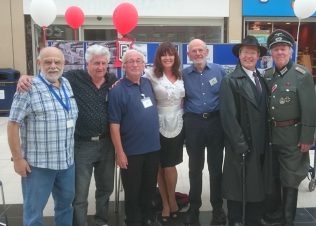 Image of Heritage Group members meeting famous faces during the 2017 Retro Day
