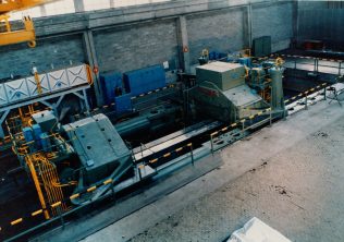 3,900 Aluminium Plate Stretcher being installed at CEGEDUR's Works in Issoire, France | Gloucestershire Archives