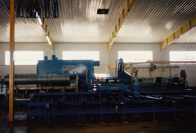 JB362  Side view of press with handling gear and log heater in foreground | Supplied by John Bancroft
